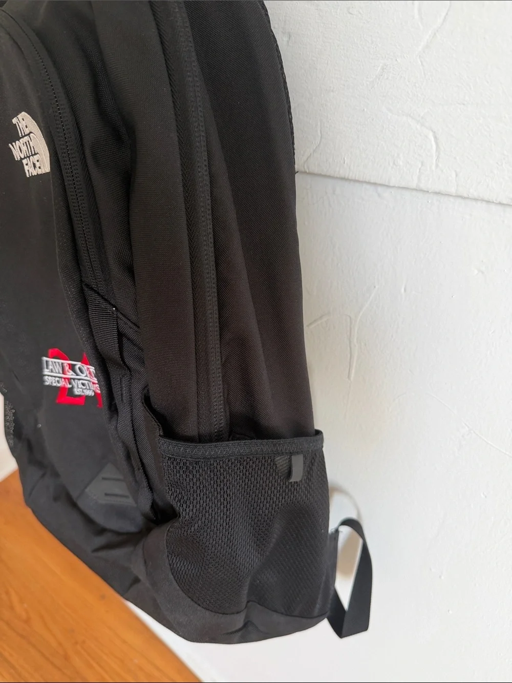 The North Face Black Backpack with Red Law & Order SVU Accent